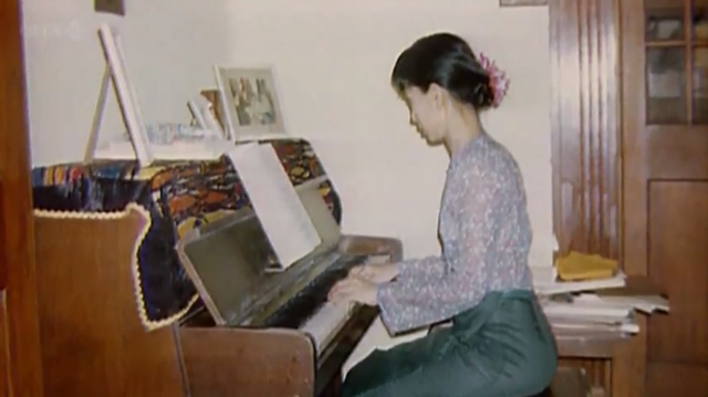 Aung San Suu Kyi at the piano