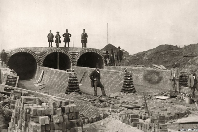 Photo of Bazalgette surveying sewer